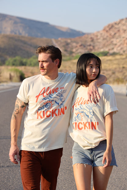 International - Alive N' Kickin' Tee